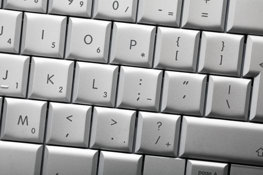 Keyboard of a notebook computer. White and black.