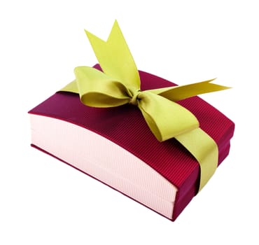 Luxury gift box in dark red shades with green satin ribbon and bow isolated over white background.