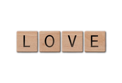Wooden letters spelling love on white background