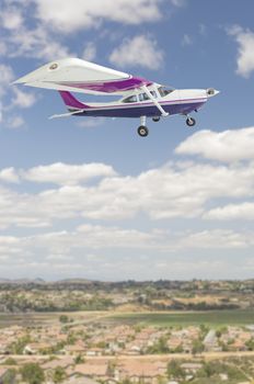 The Cessna 172 Single Propeller Airplane Flying In The Sky.