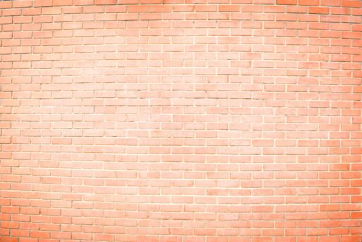 brown brick wall is painted white in the middle for texture background
