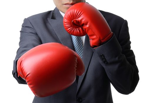 businessman with red boxing glove punch to the goal, business concept