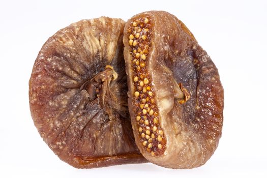 some fruits of dried fig isolated on white background.