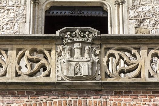  Coat of arms of Cracow- stone carving on Florian Gate in Cracow, Poland.