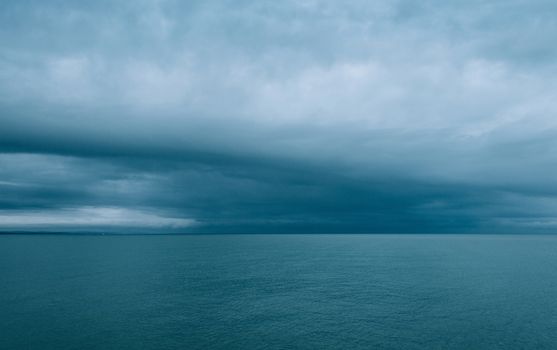 Cloudy and minimalist seascape, film emulation filter applied