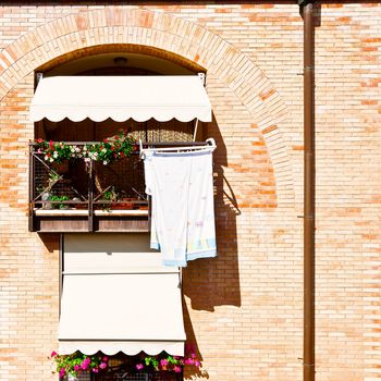 Drying Clothes on the Facade of Italian House