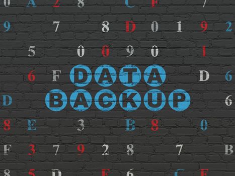 Data concept: Painted blue text Data Backup on Black Brick wall background with Hexadecimal Code