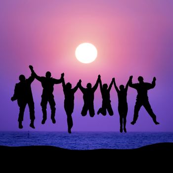 Group of friends jumping against sunset above the sea