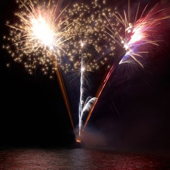 Colorful fireworks on the black sky background