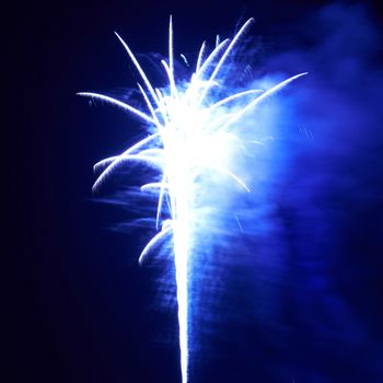 Blue colorful fireworks on the black sky background