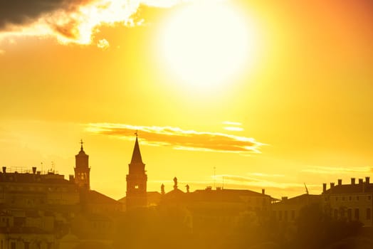 Sunset in Venice. View from the sea to Saint Mark square