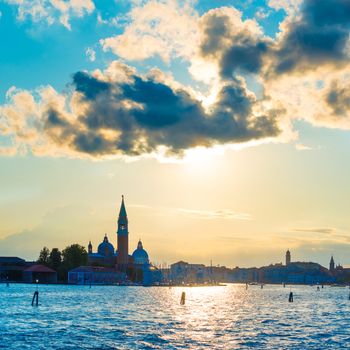 Sunset in Venice. View from the sea to Saint Mark square