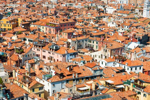 Venice roofs from above. Aerial view of houses, sea and palaces from San Marco tower