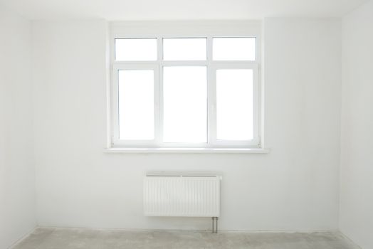 White room with window full of light