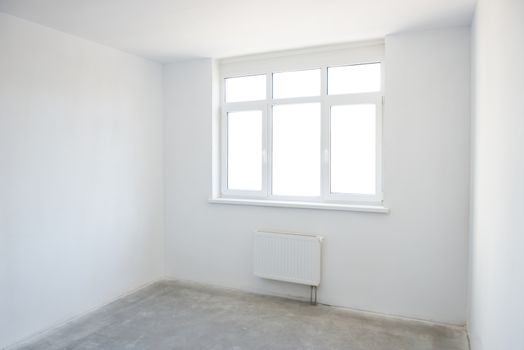 White room with window full of light