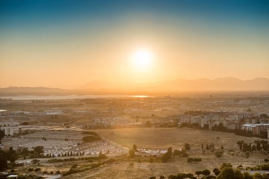 Sunset over european city. Cagliari, Sardinia, Italy.