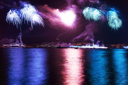 Blue colorful fireworks on the black sky background