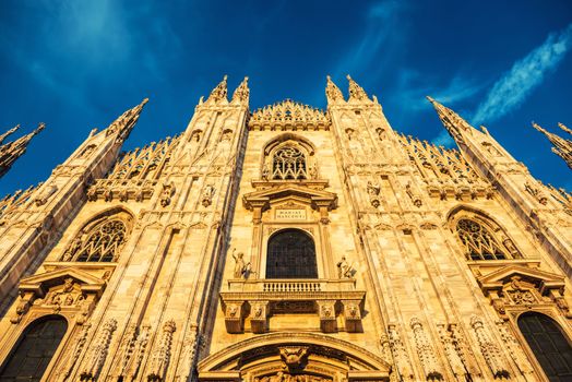 Night view of famous Milan Cathedral (Duomo di Milano) on piazza in Milan, Italy