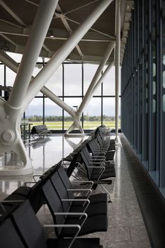 Chairs in a row at airport waiting room