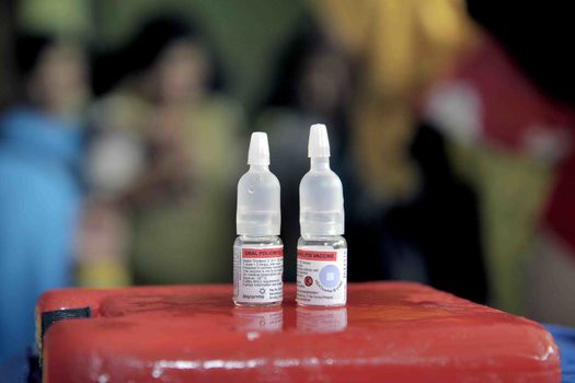INDONESIA, Jakarta: Polio immunization treatment is pictured in Ciracas, East Jakarta on March 10, 2016 during  National Polio Immunization Week. Indonesian Health Minister Nila Moeloek announced on March 8, 2016 plans to vaccinate 23.7 million babies — from birth to 59 months of age — to keep the world on track toward being polio-free by 2020.