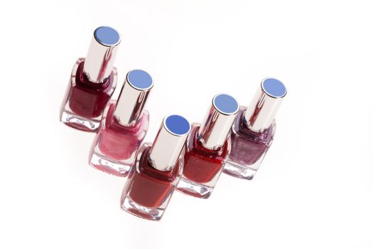 Bottles with enamel on isolated white background