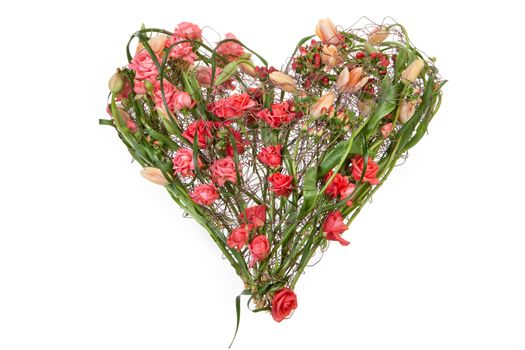 Heart shaped composition made of wire and flowers on isolated background