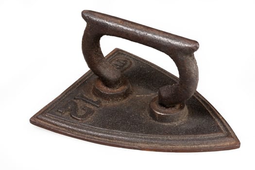 Old metal iron on isolated studio white background