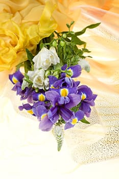 Still life with flowers on a studio background