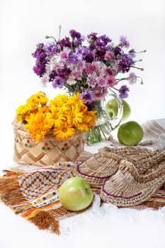 Flowers and Russian national artworks on an isolated studio background