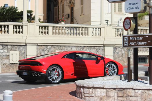 Monte-Carlo, Monaco - March 9, 2016: Red Sport Car Lamborghini Huracan LP 610-4 on Avenue d'Ostende in Monte-Carlo, Monaco in the south of France