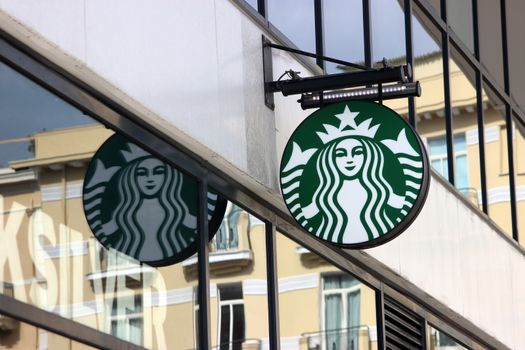 Monte-Carlo, Monaco - March 9, 2016: Starbucks Sign is Displayed at the Facade of a Starbucks Store. Starbucks Corporation is an American Coffee Company and the Largest Coffeehouse Company in the world with 23,450 Stores in 67 Countries