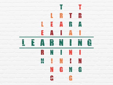 Education concept: Painted green word Learning in solving Crossword Puzzle