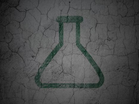 Science concept: Green Flask on grunge textured concrete wall background