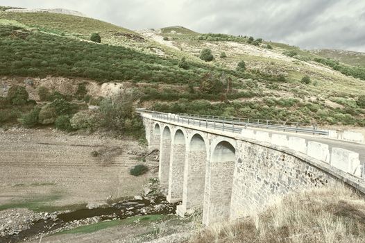 Bridge on the Bottom of Canyon in the Cantabrian Mountains, Vintage Style Toned Picture