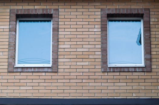 closed window in a brick old house