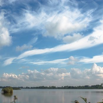 blue lake with cloudy sky, nature series