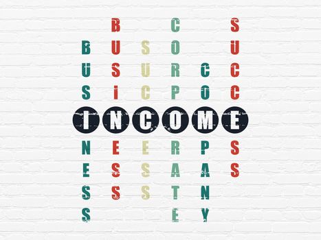 Finance concept: Painted black word Income in solving Crossword Puzzle