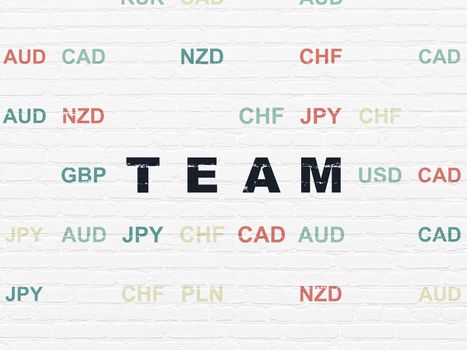 Business concept: Painted black text Team on White Brick wall background with Currency
