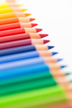 Stack of Colour pencils isolated on white