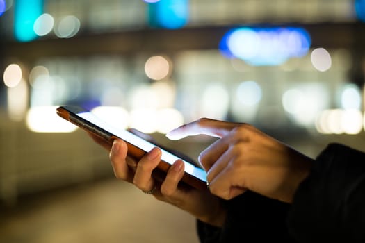 Woman finger touch on blank screen of cellphone