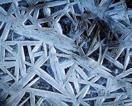 abstract winter background geometric shapes on the frozen water