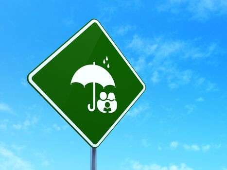 Safety concept: Family And Umbrella on green road highway sign, clear blue sky background, 3d render