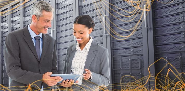 Business people using tablet computer  against futuristic glowing lines on black background