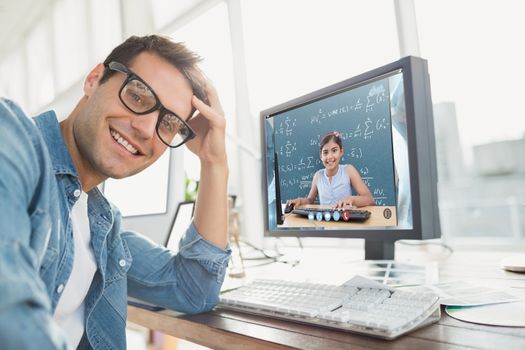  Portrait of a casual businessman posing and smiling against blue Portrait of a casual businessman posing and smiling in the office