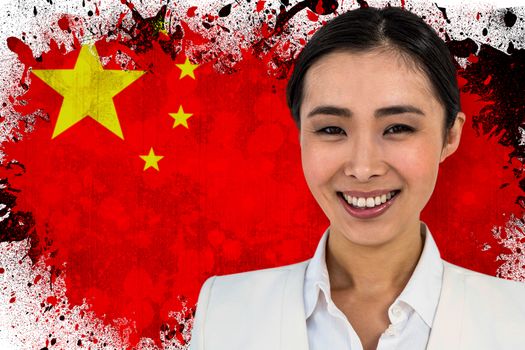 SMiling businesswoman looking at the camera against china