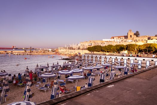 Otranto, Italy - August 11, 2014: Sunset on the seafront at Otranto in southern Italy.