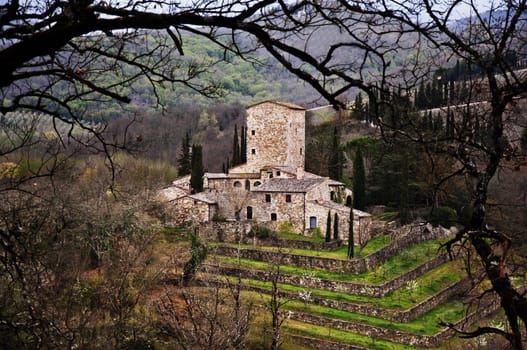 Tuscany landscape with typical old medieval house