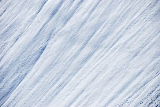 Background made of snow on a mountain slope.