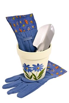 Pretty little gardening gloves with flower pot and trowel.