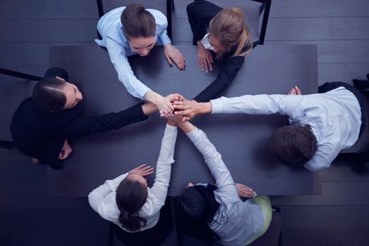 People with their hands together. Business team work concept